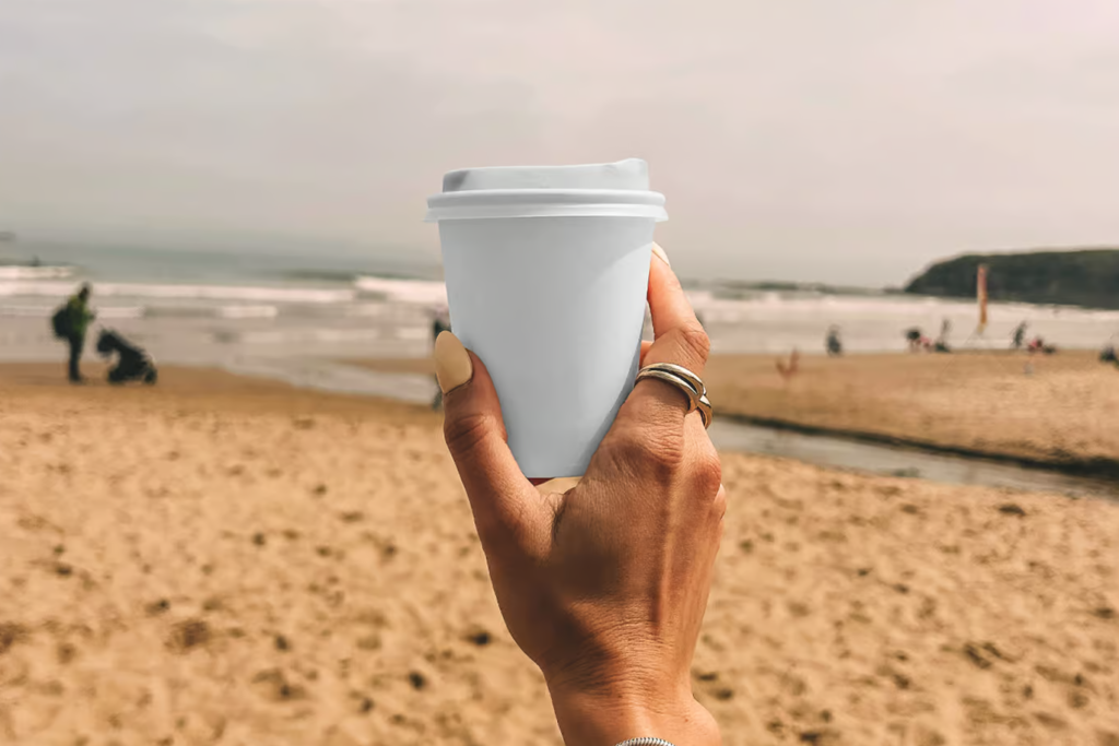 Paper Coffee Cup on the Beach Mockup
