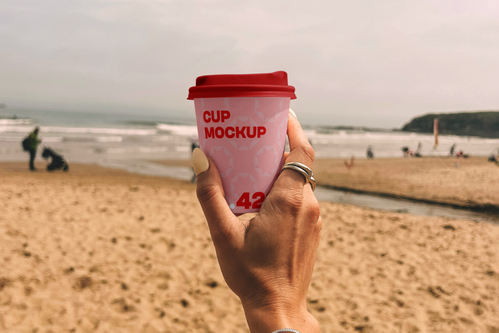 Paper Coffee Cup on the Beach Mockup